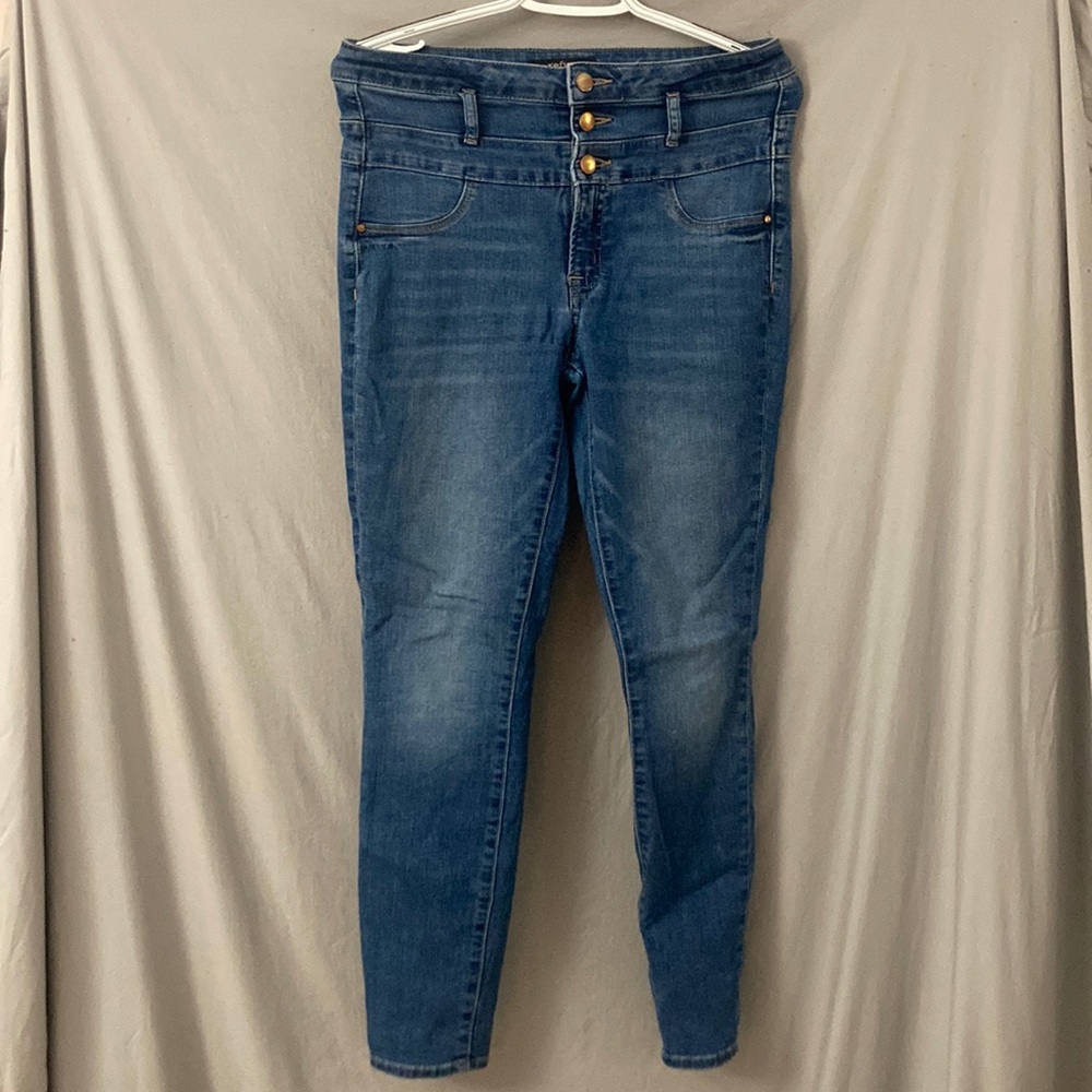 Button fly skinny jeans